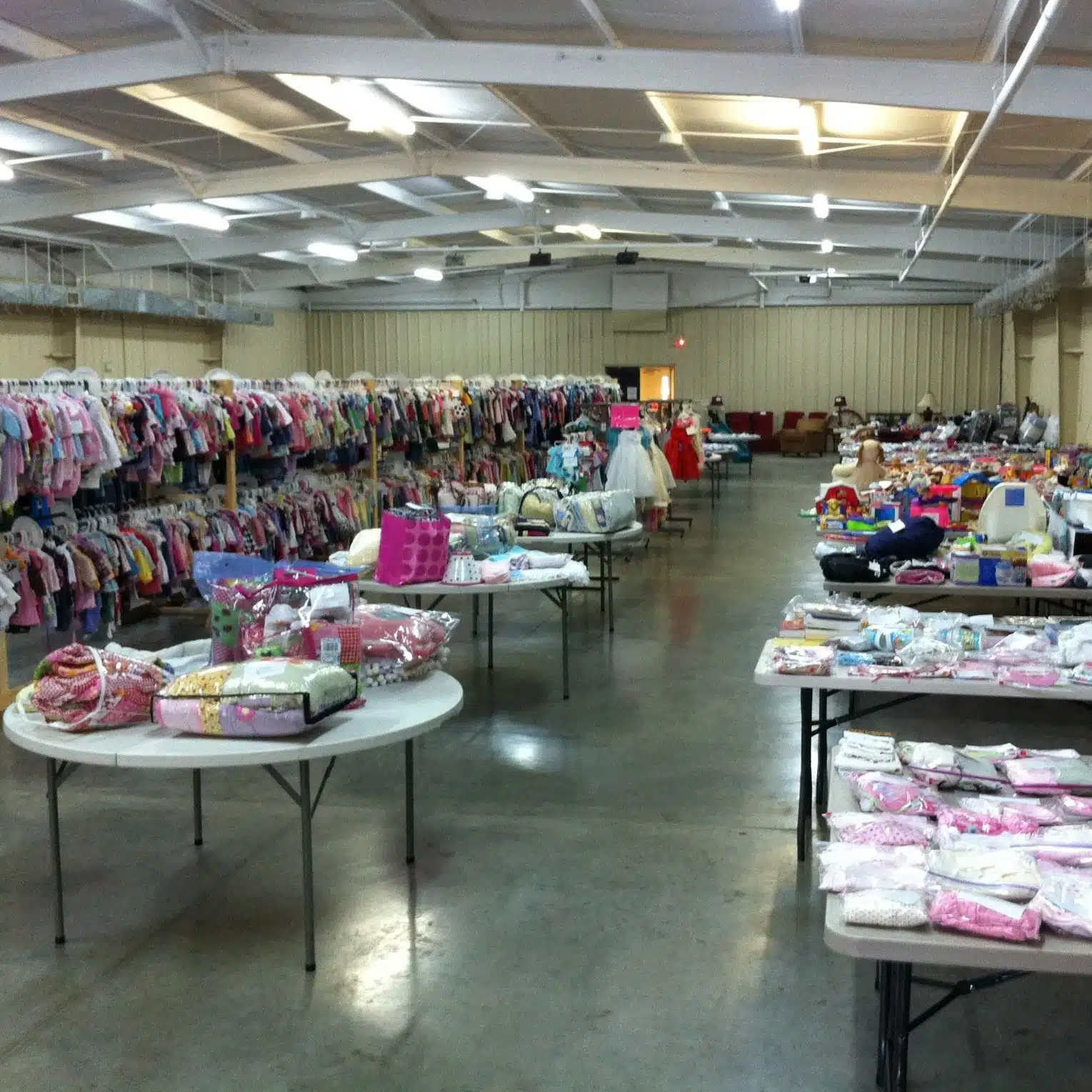 Clothing on tables at the Funshine Kids Consignment Sale